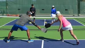 playing pickleball playing pickleball